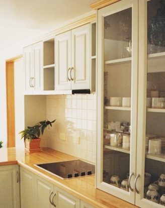 A new Kitchen in the Scandinavian Style in Adelaide, with Timber Bench tops and Thermolaminated panel doors; by Compass Kitchens